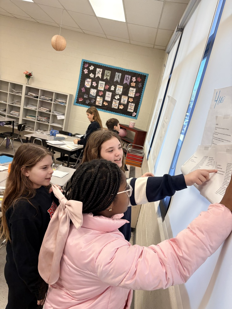 ELA class is reviewing their answers from the comprehension test by doing a group gallery walk to learn where they may have made a mistake or where they were successful!📒📝