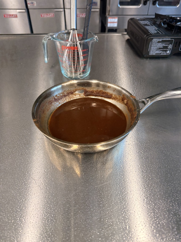 Chef White's demo dark brown roux for gumbo!