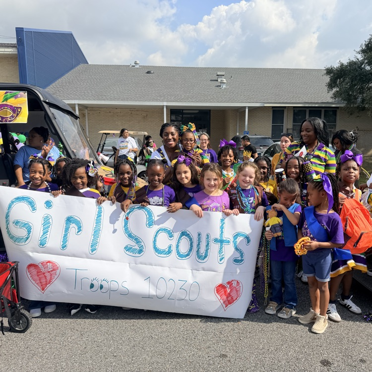 PAES Girl Scouts @ the Mardi Gras Parade 💛💜💛