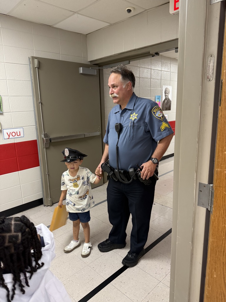 Checking on students getting ready for the STEM Competition .