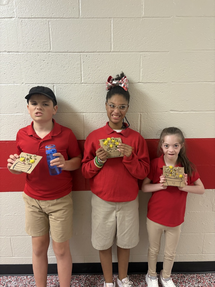 students picking flowers