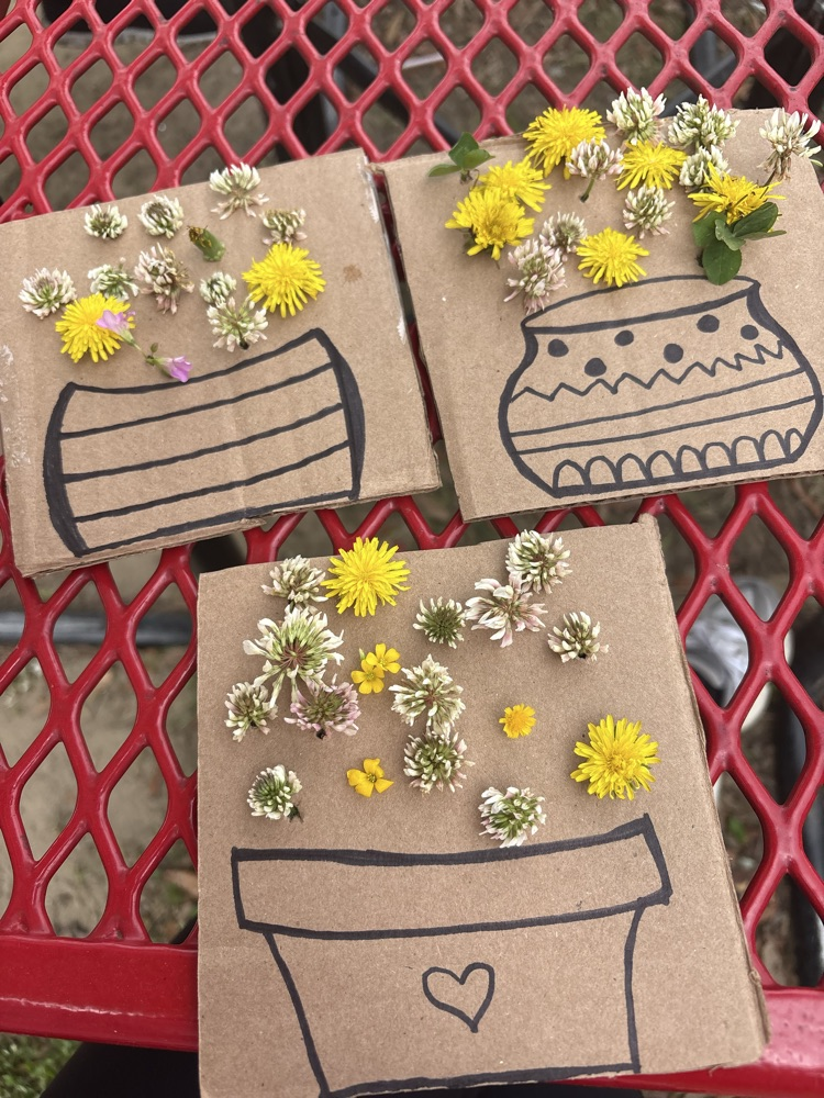 students picking flowers