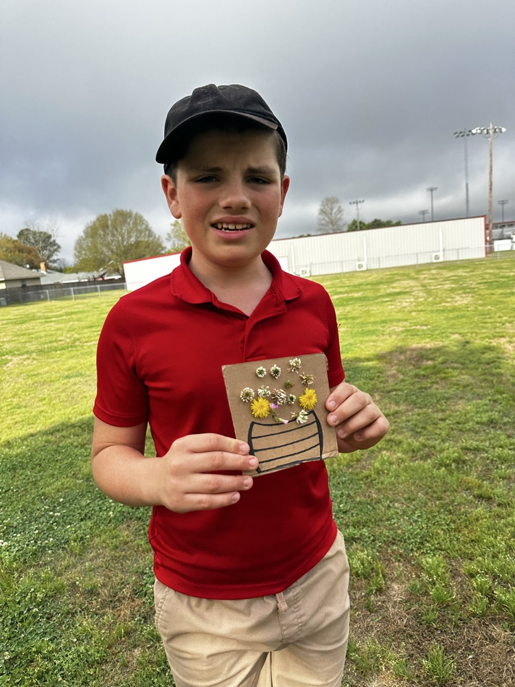 students picking flowers