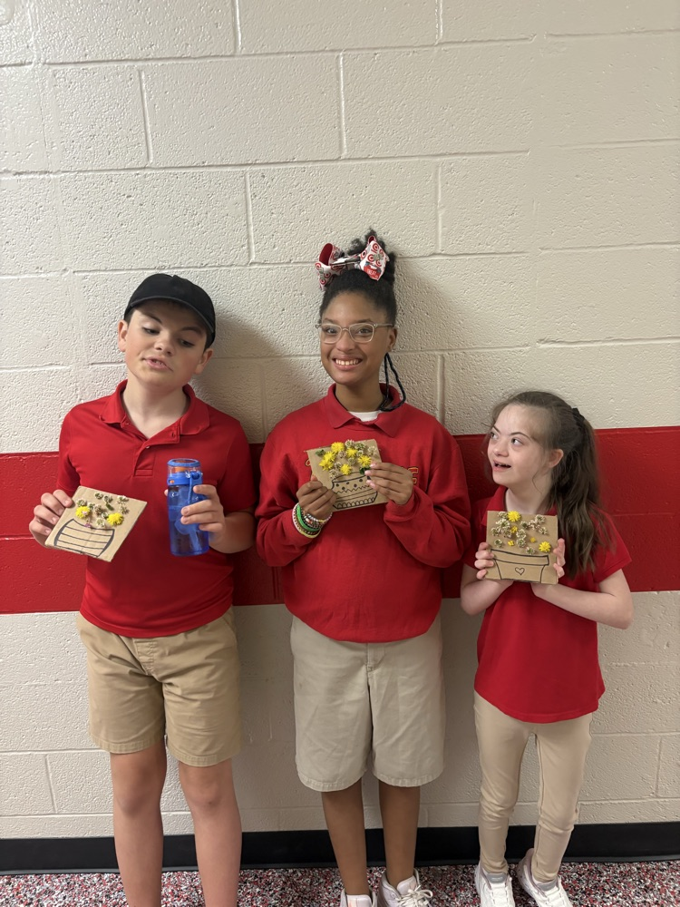 students picking flowers