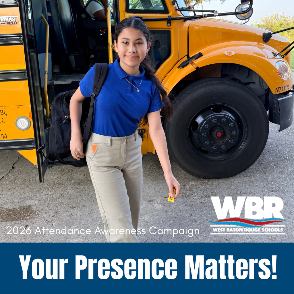 Girl standing in front of a school bus with a sign reading "Your Presence Matters!"