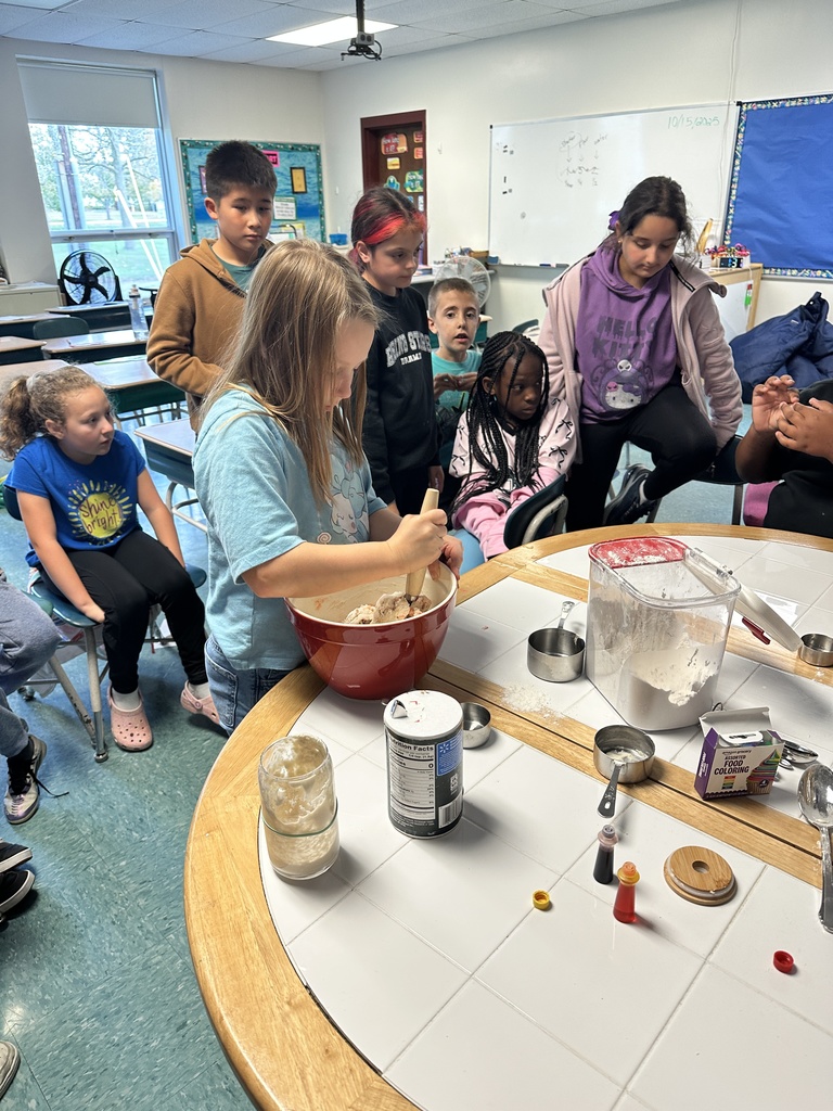 student mixing the dough
