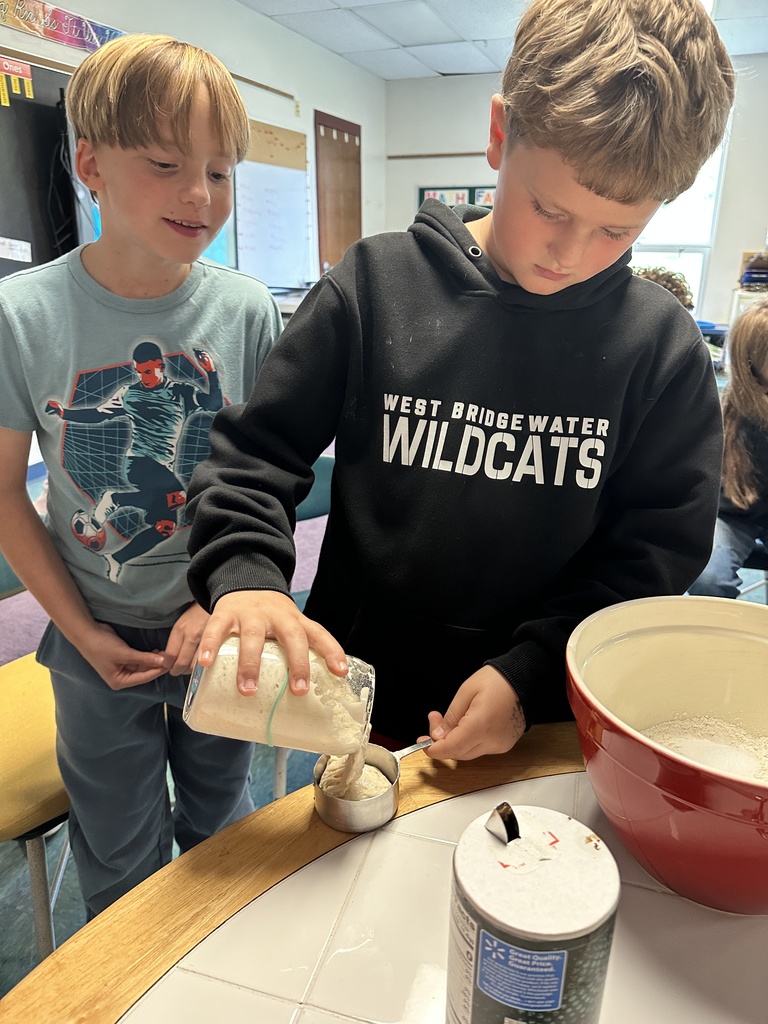 boys measuring the starter