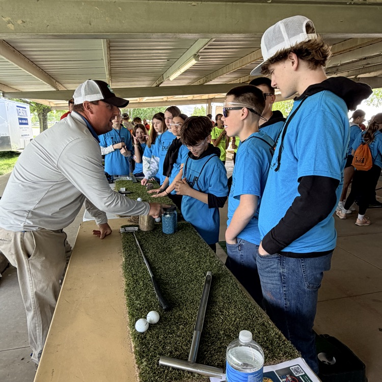 7th graders at turf care station
