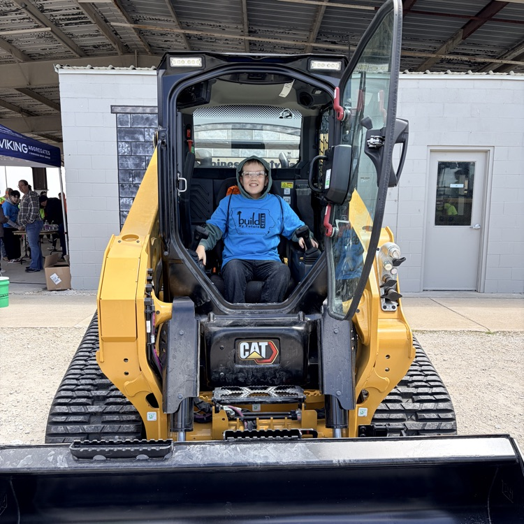 7th graders at big machinery station