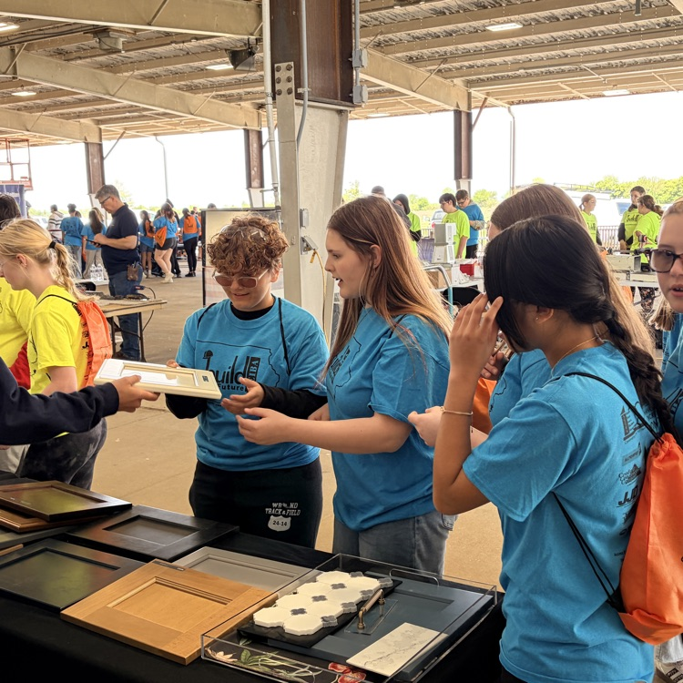 7th graders at cabinetry station