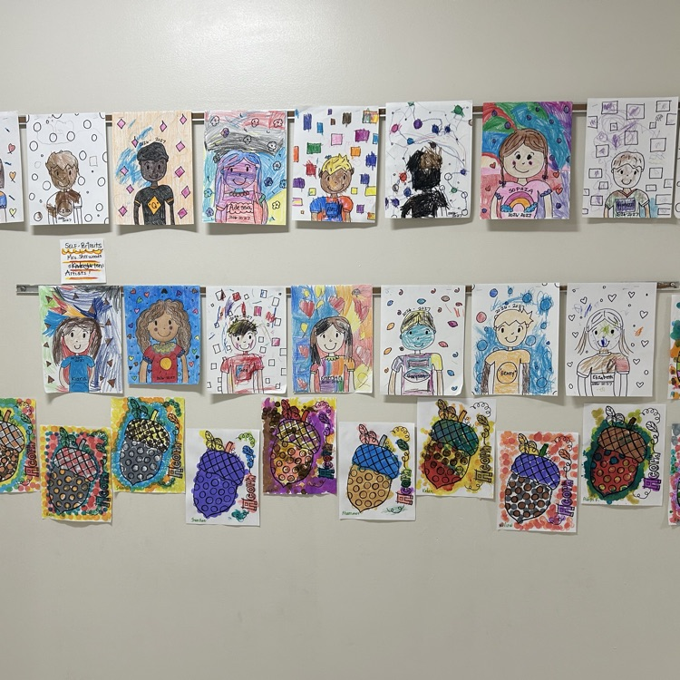 kindergarten self-portraits and painted fall acorns