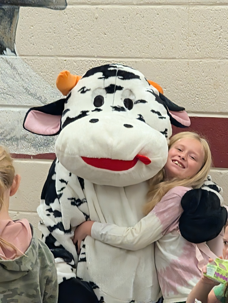 students and staff celebrated school milk day with cow mascot and lunch ladies
