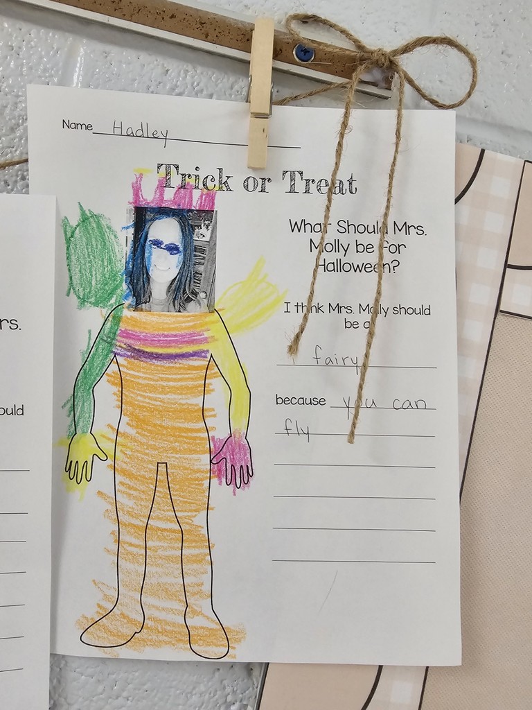 teacher dressed in costume created by kindergarten student