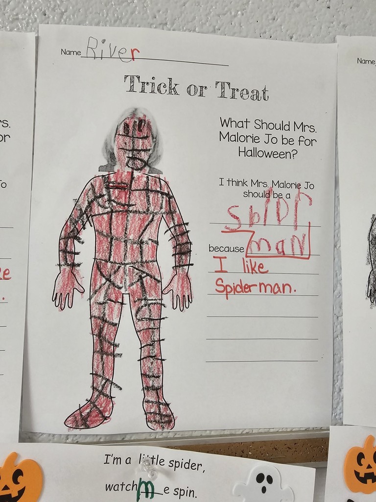 teacher dressed in costume created by kindergarten student