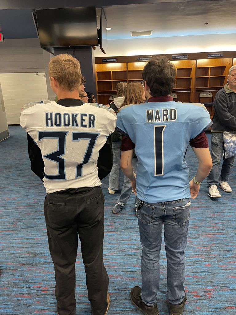 West Carroll FBLA students trying on TN Titans gear