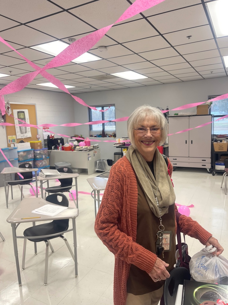 Mrs. Linda Hatfield pictured with 80th birthday decorations 