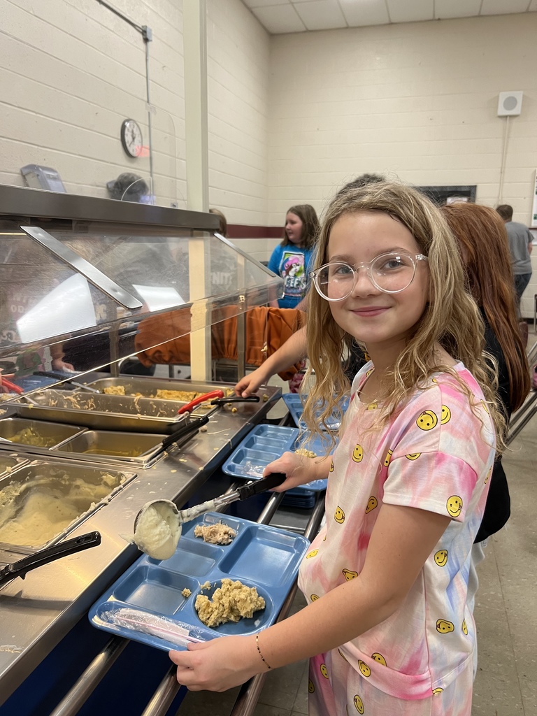 West Carroll Elementary School student enjoying a Thanksgiving meal. 