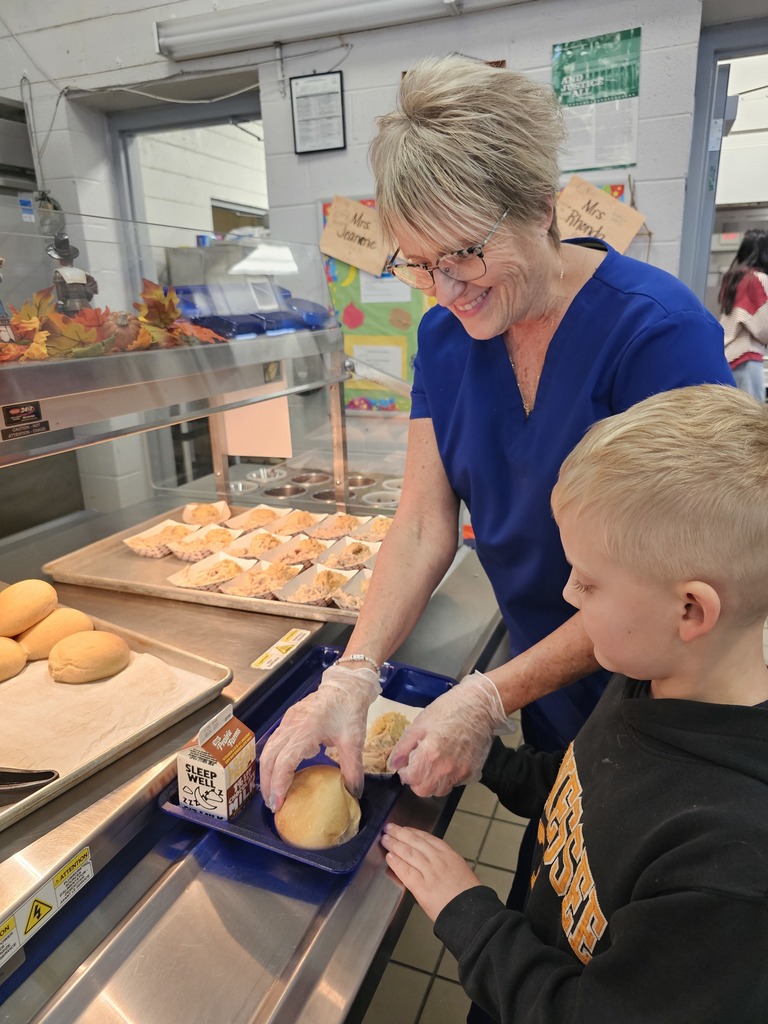 West Carroll Primary School student enjoying a Thanksgiving meal. 