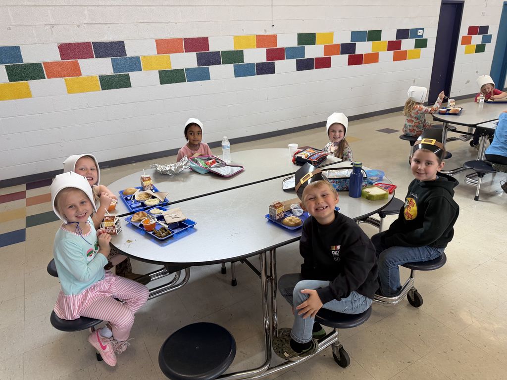West Carroll Primary School students enjoying a Thanksgiving meal. 