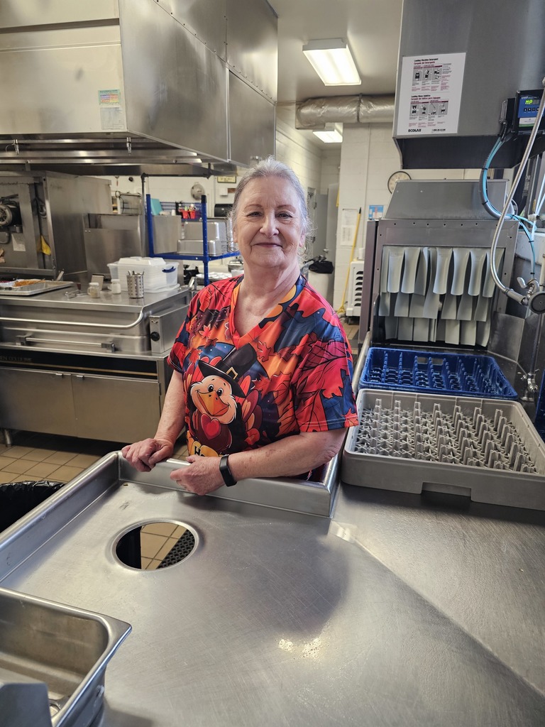 West Carroll Primary School cafeteria staff preparing a Thanksgiving meal 