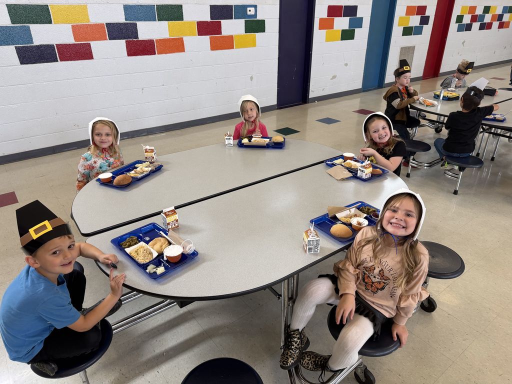 West Carroll Primary School students enjoying a Thanksgiving meal. 