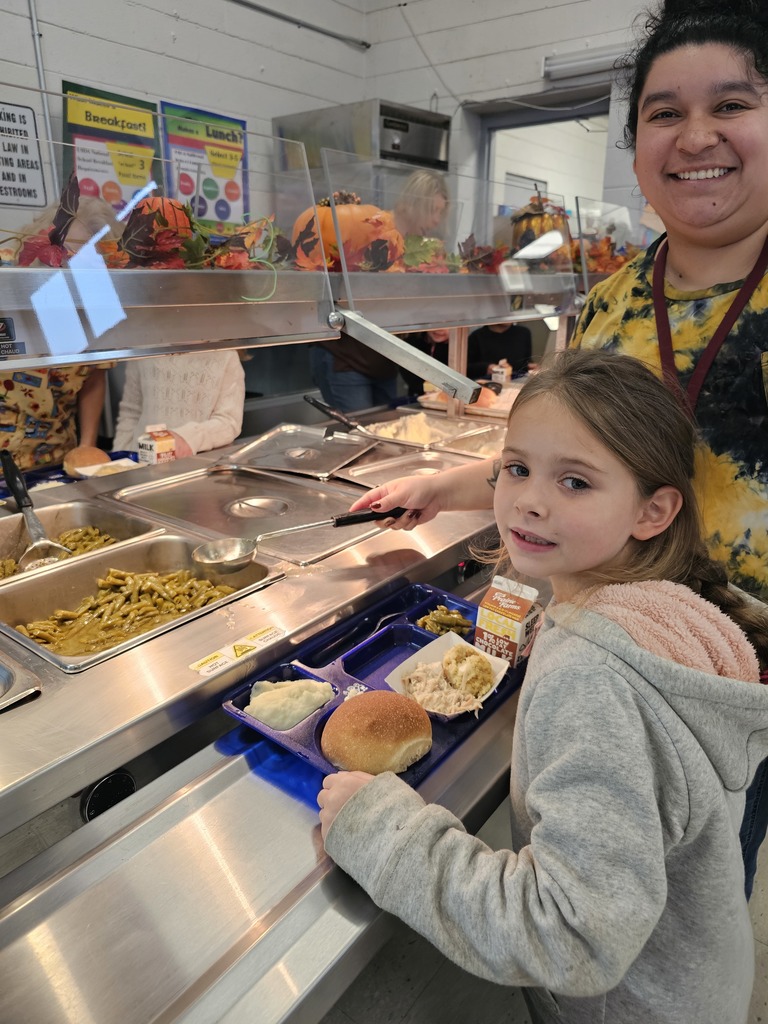 WCP thanksgiving lunch with student in line and lunchladies