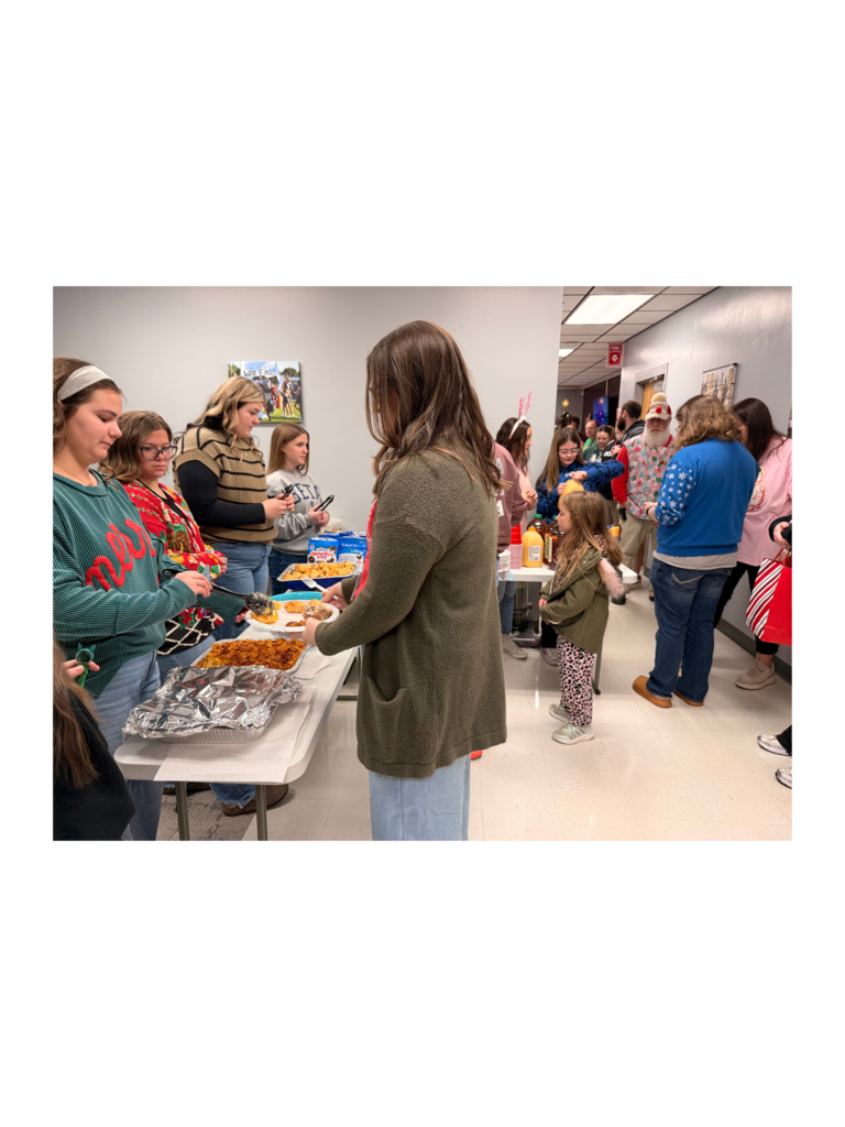 Staff being served breakfast by SGA members