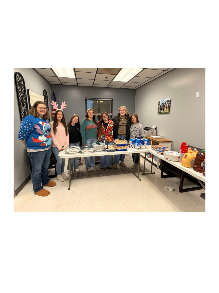SGA Members presenting teacher/staff breakfast