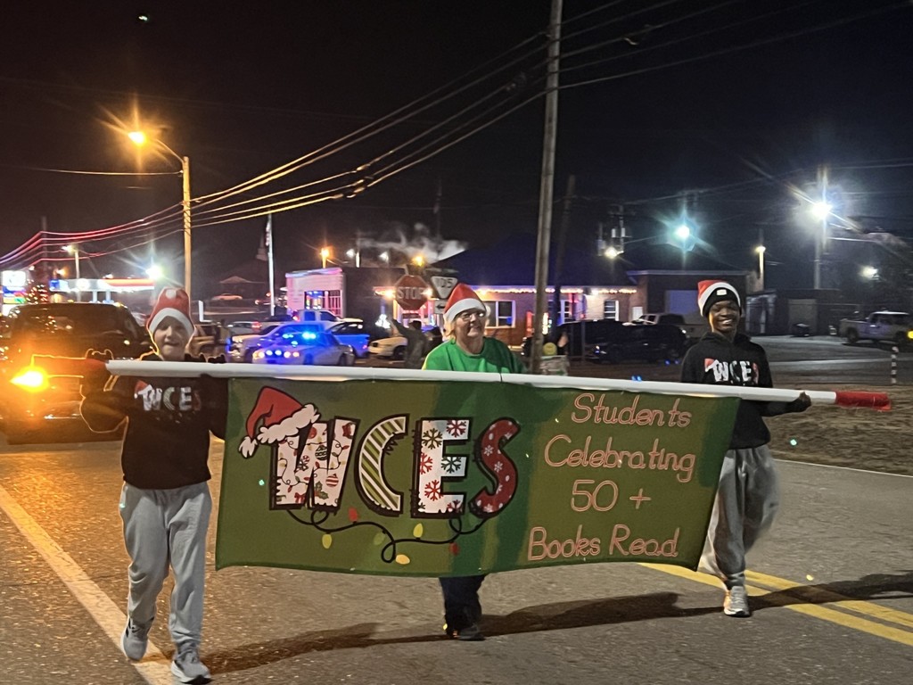 wces students in town parade after reading 50+ books since august