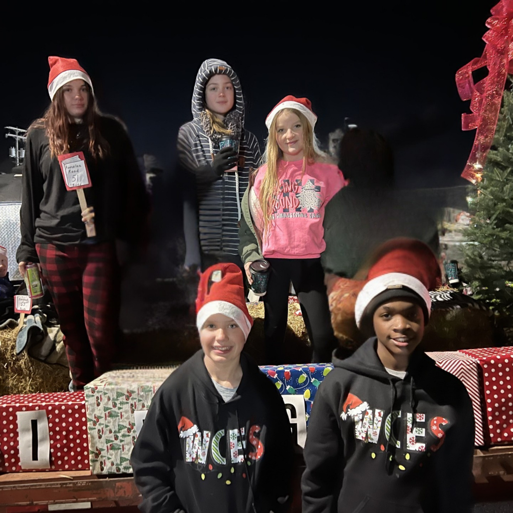 wces students in town parade after reading 50+ books since august