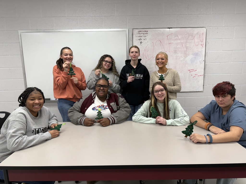 Human Studies students with their completed sewing projects