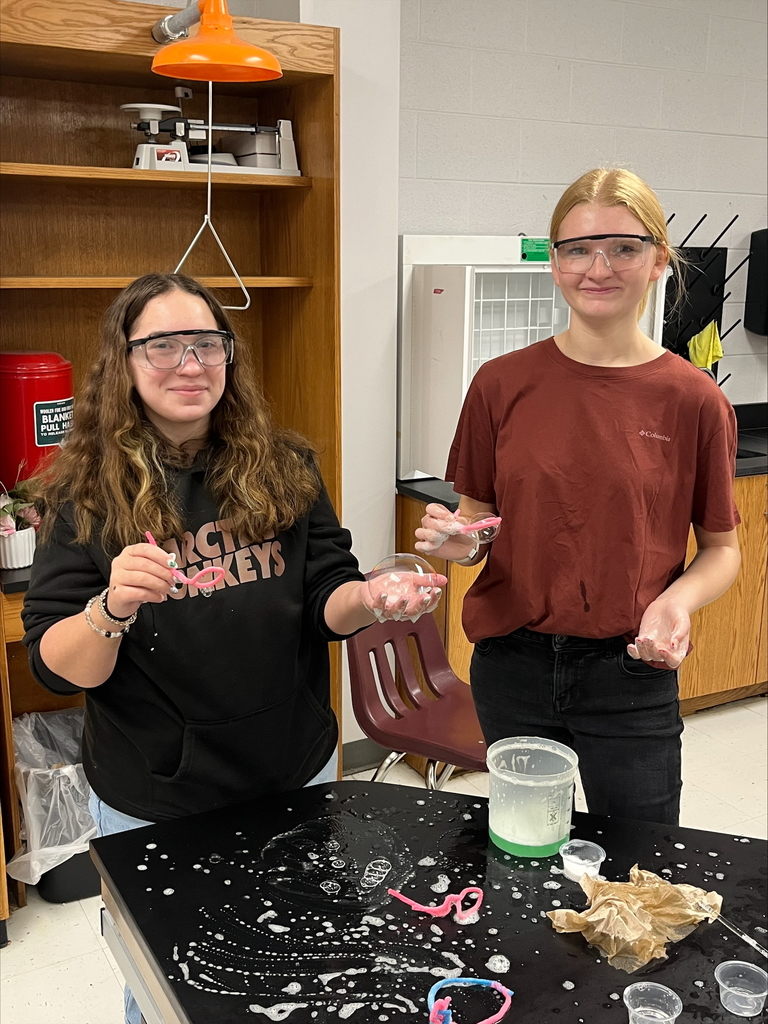 Chemistry students experimenting with bubbles.