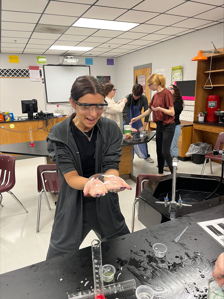 Chemistry students experimenting with bubbles.