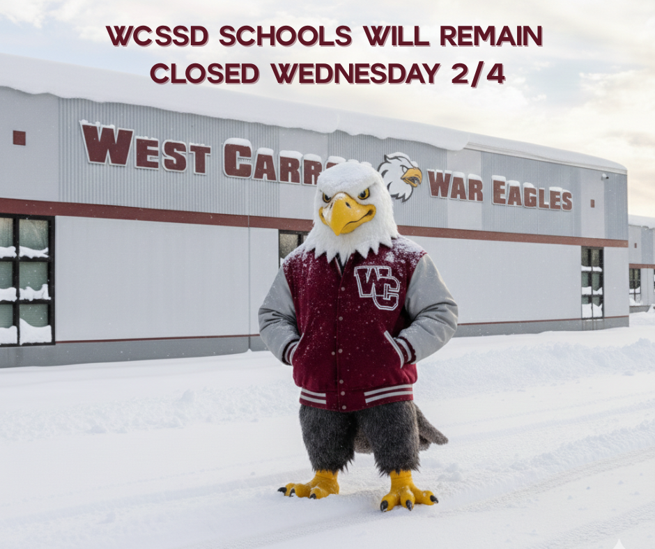 Eagle mascot in the snow in front of WCHS