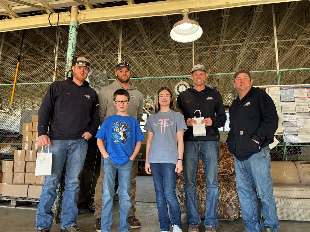 wc betas pose with cc electric dept workers with care bags for the beta service project for february, care bags for a cause.
