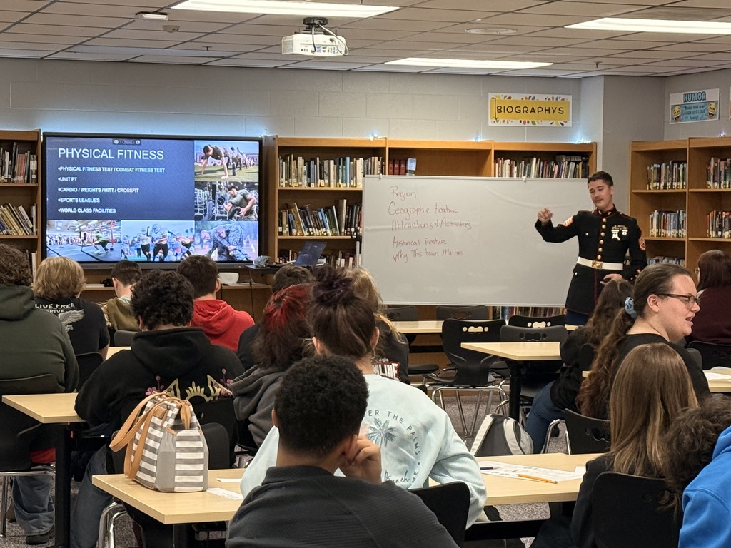 United States Marine speaking to juniors about military opportunities after high school