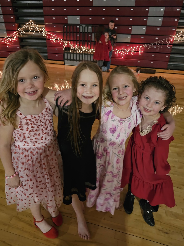 girls at daddy daughter dance in wchs gym
