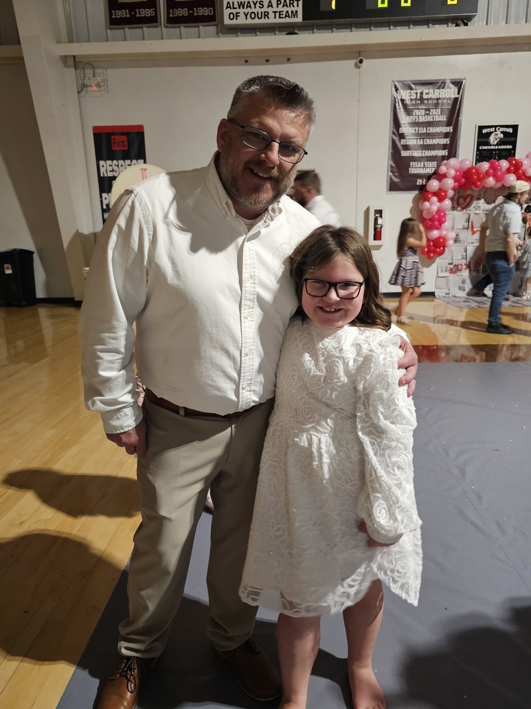 girl with father at daddy daughter dance