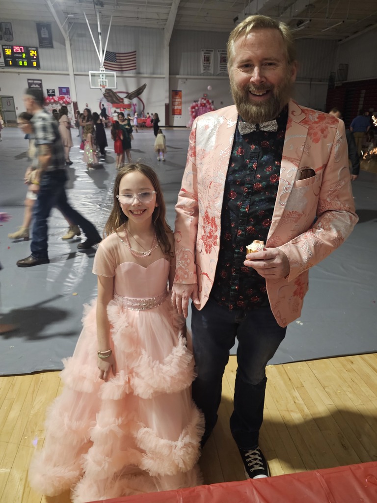 girl with father at daddy daughter dance