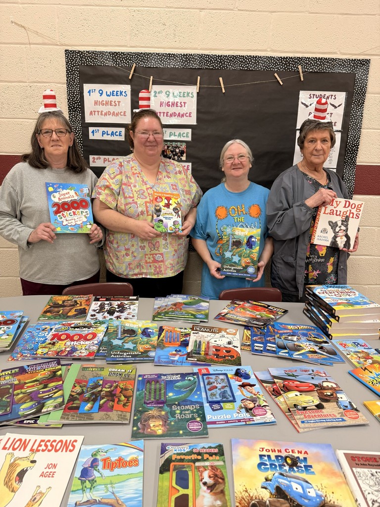 wces lunchladies with books given to students during lunch from the wces lunchladies