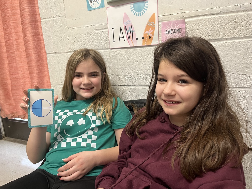 west carroll elementary student working as a fraction detective in Mrs. Lisa's math class