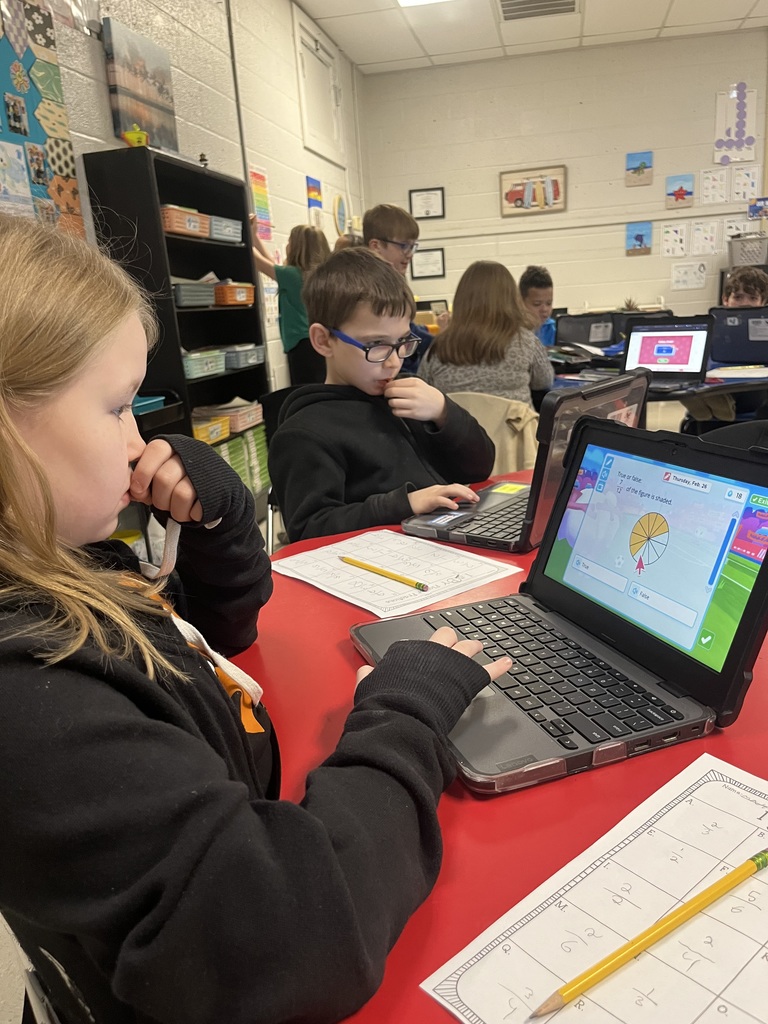 west carroll elementary student working as a fraction detective in Mrs. Lisa's math class