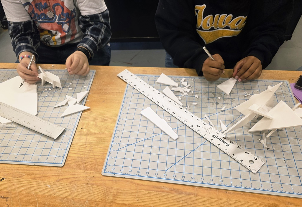 Students creating art at the UTM art show