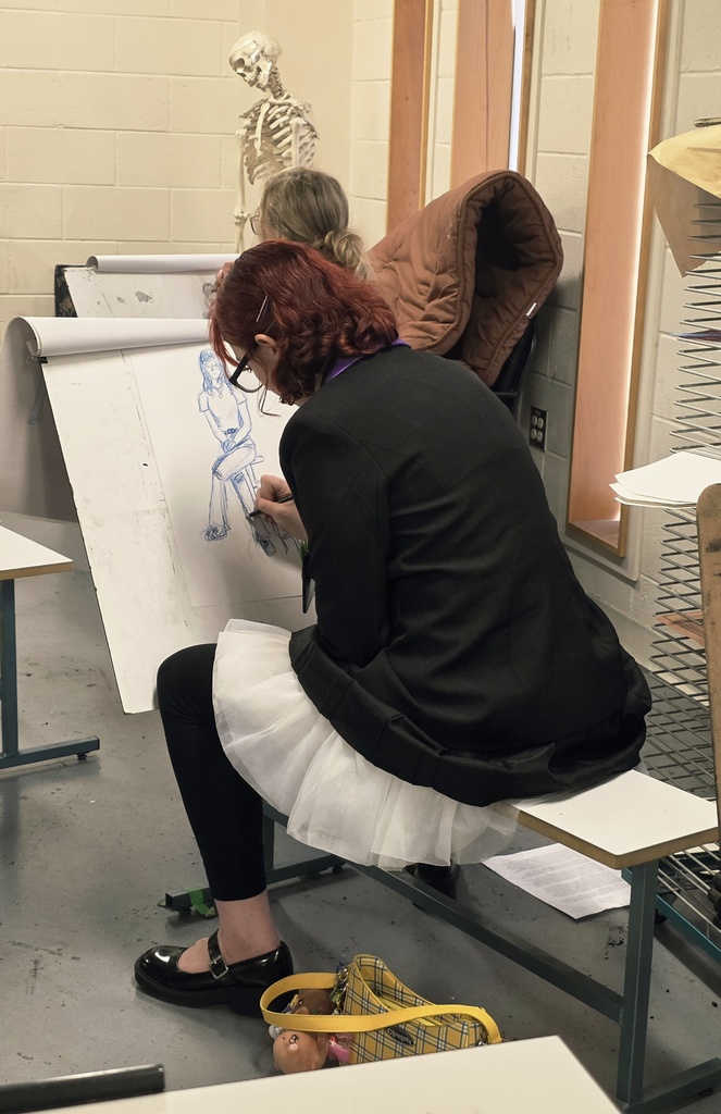 West Carroll student creating at the UTM art show