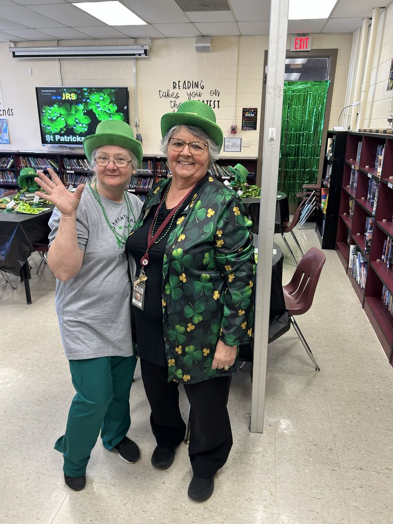 two west carroll elementary employees dressed for st patrics day for the reading celebration