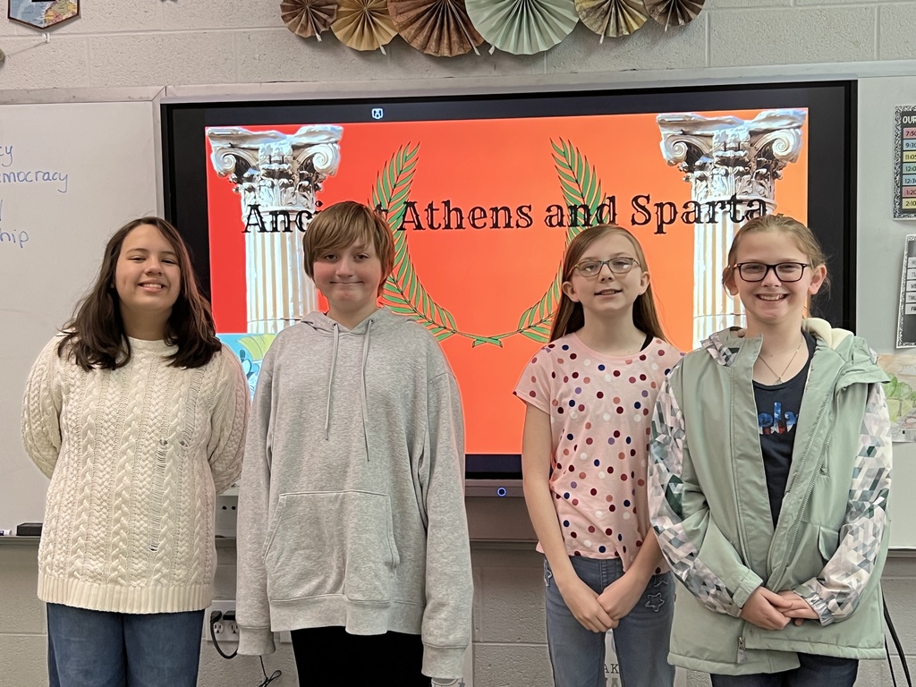 wces students showing their athens sparta posters and presentatins