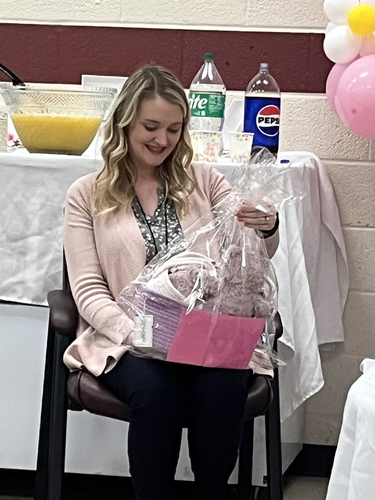 dr jessica williams opening gifts at her shower