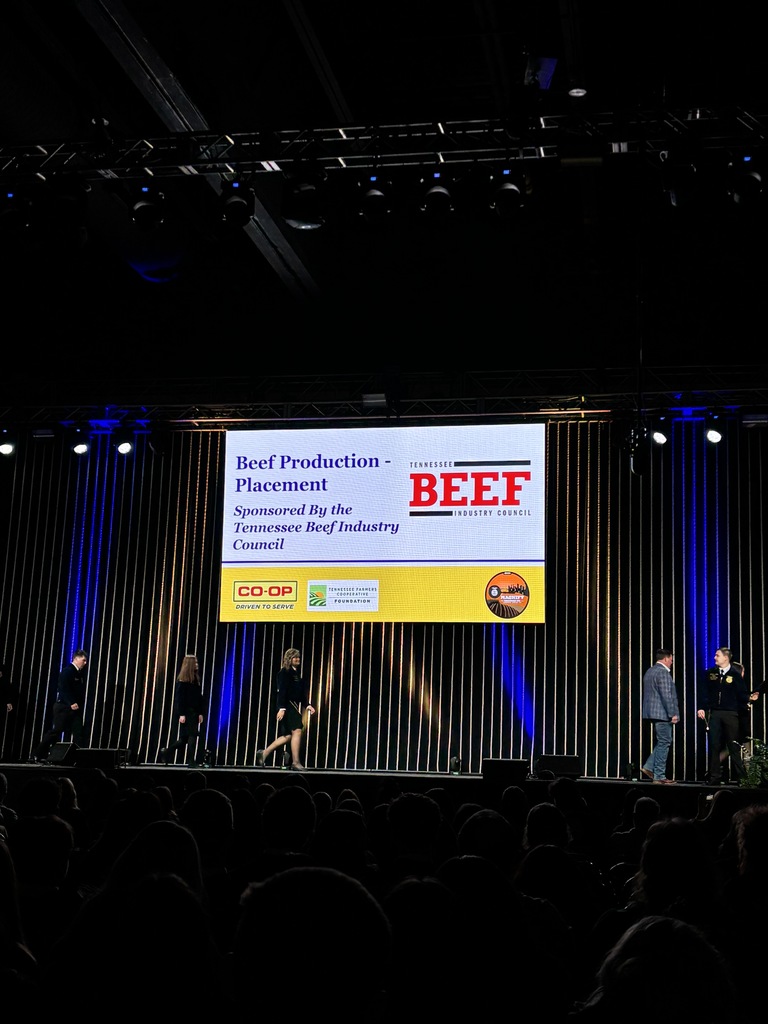 Carson Cooper being presented his award for Beef Production - Placement, State winner