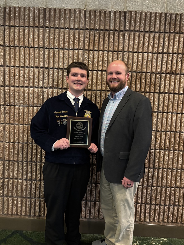 Carson Cooper with WCHS FFA club sponsor, Noah Rogers