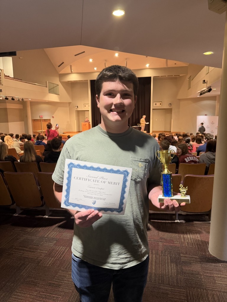 Carson Cooper Pictured with award from UTM Math Competition 